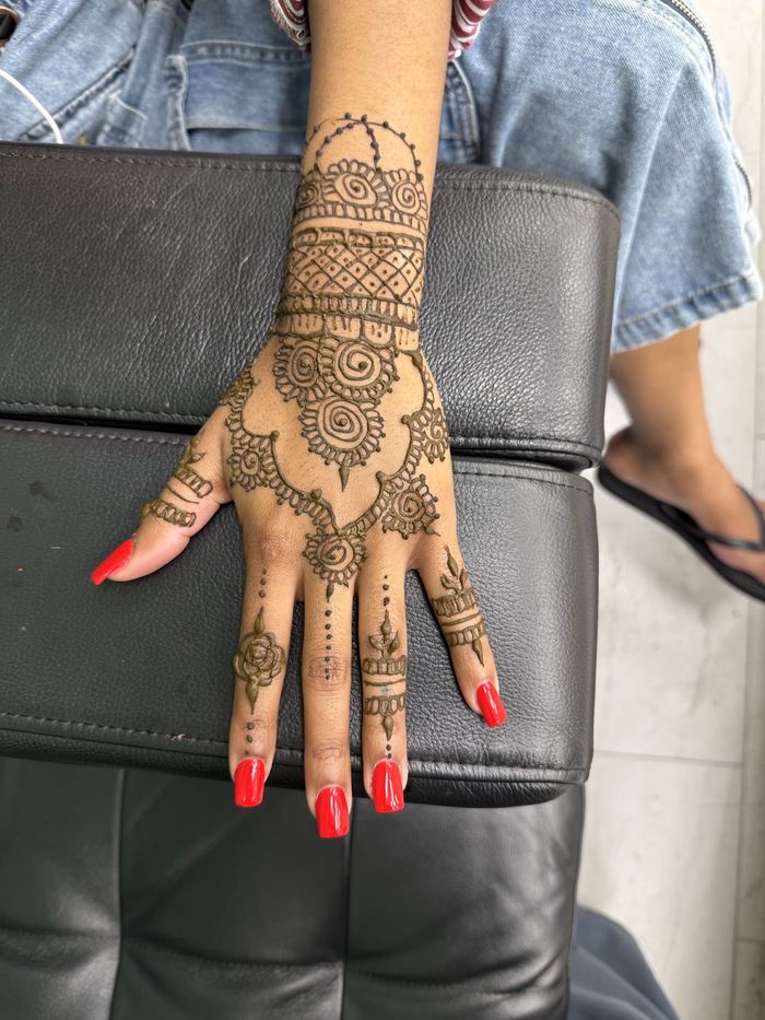 Detailed henna on a hand